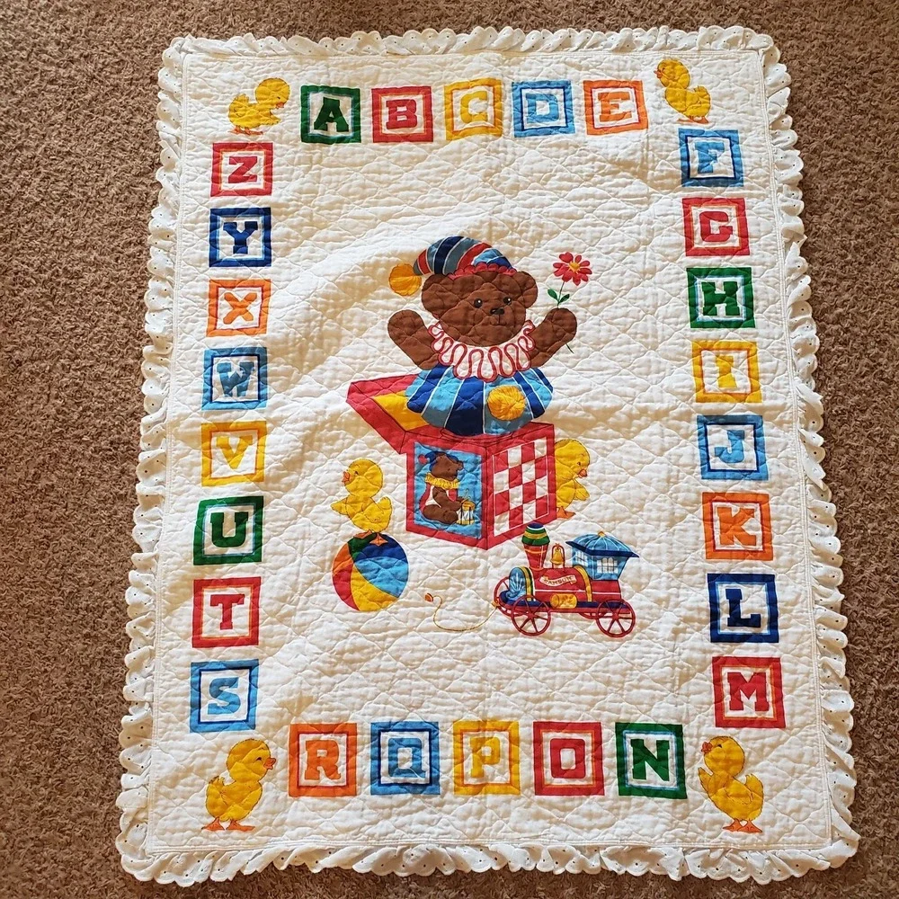 Daisy Kingdom teddy bear jack-in-the-box baby quilt Letter Blocks Hearts